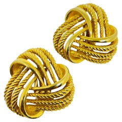Vintage gold tone massive designer 80s clip on earring