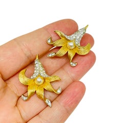 BOUCHER signed vintage gold tone rhinestones flower designer clip on earrings