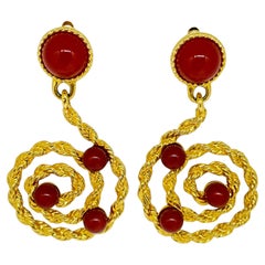 AVON signed vintage gold tone faux carnelian swirl designer clip on earrings