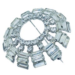 Vintage silver tone baguette rhinestones round designer brooch