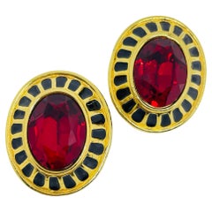 SWAROVS swan signed vintage gold plated red crystals designer clip earrings