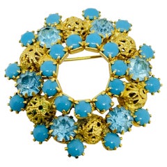 Vintage gold tone turquoise blue rhinestones designer brooch