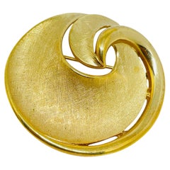 TRIFARI crown signed vintage gold tone swirl leaf designer brooch