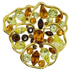 Spilla vintage firmata NOLAN MILLER con motivo floreale in strass color oro