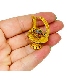 Vintage gold tone rhinestones flower basket designer brooch