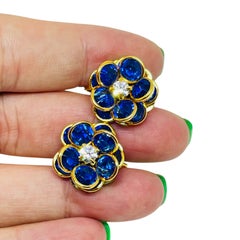AVON signed vintage gold tone sapphire crystals flower designer clip on earrings