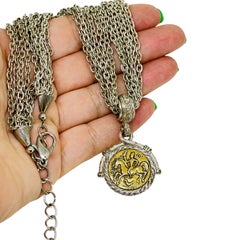 Vintage 1928 brand signed silver gold tone multi chain coin replica necklace