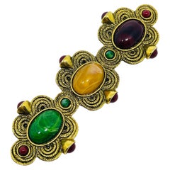 Spilla di design in stile etrusco-bizantino con cabochon vintage color oro