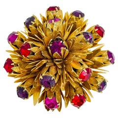 Spilla di design vintage con un grande fiore in strass color oro