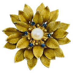Spilla di design KREMENTZ vintage in oro placcato con zaffiro, strass e perla a forma di fiore