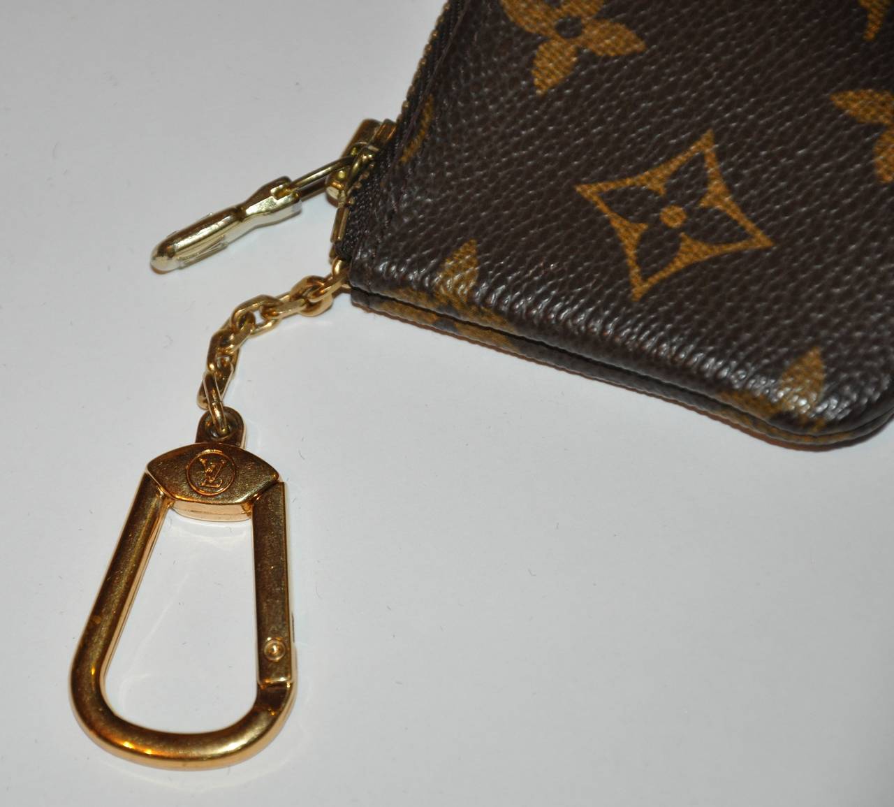 Louis Vuitton Signature Monogram Zippered Change Purse with Key Chain at  1stDibs  louis vuitton change purse keychain, louis vuitton key change, louis  vuitton change purses