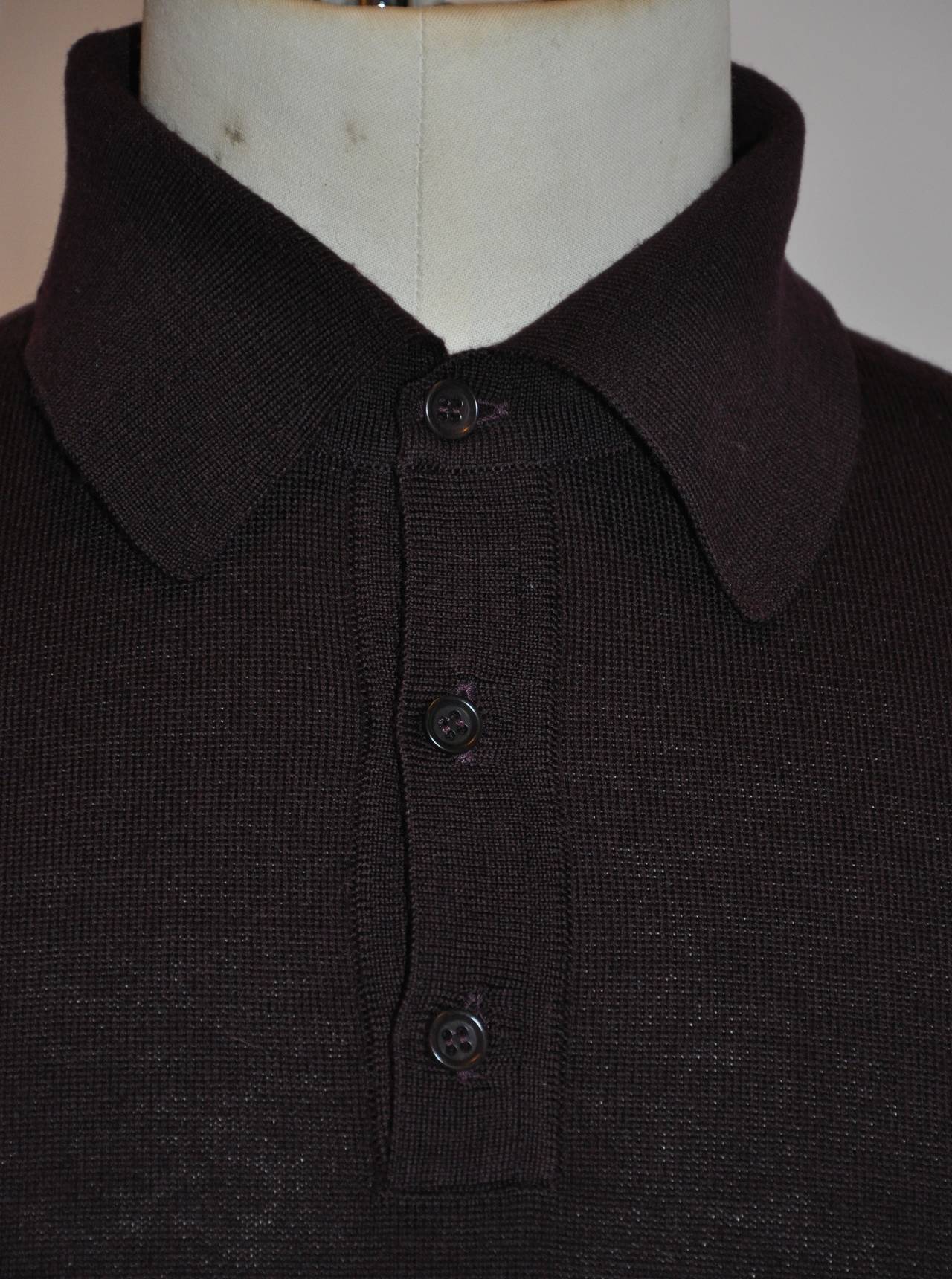 This wonderfully soft Calvin Klein men's coc-brown three-button front in superfine merino wool is size Ex-large/Italy.
   The shoulder measures 19