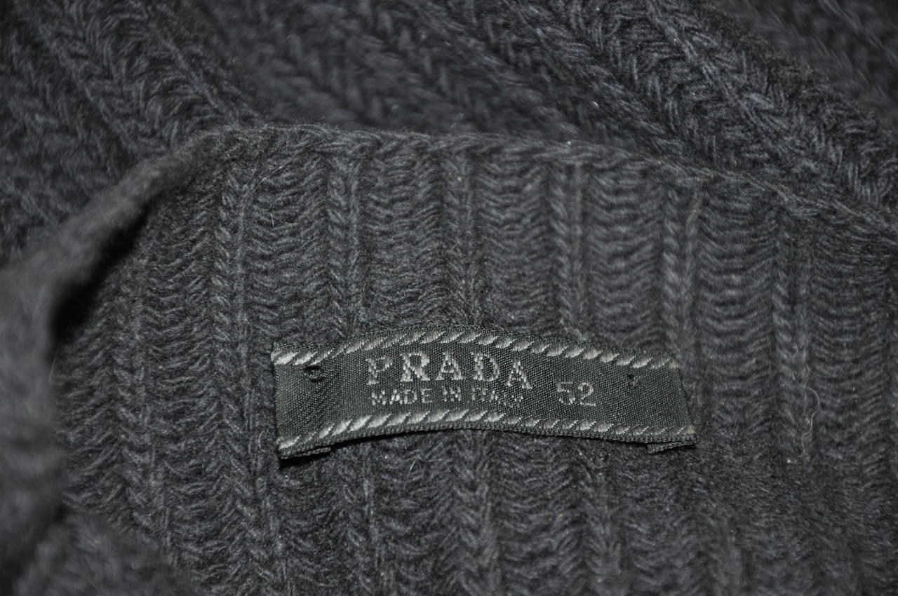 Prada's wonderfully soft men's high-neck cashmere blend pullover is 70% superfine merino wool and 30% cashmere blend. Size Ex-Large.
    The shoulder measures 18