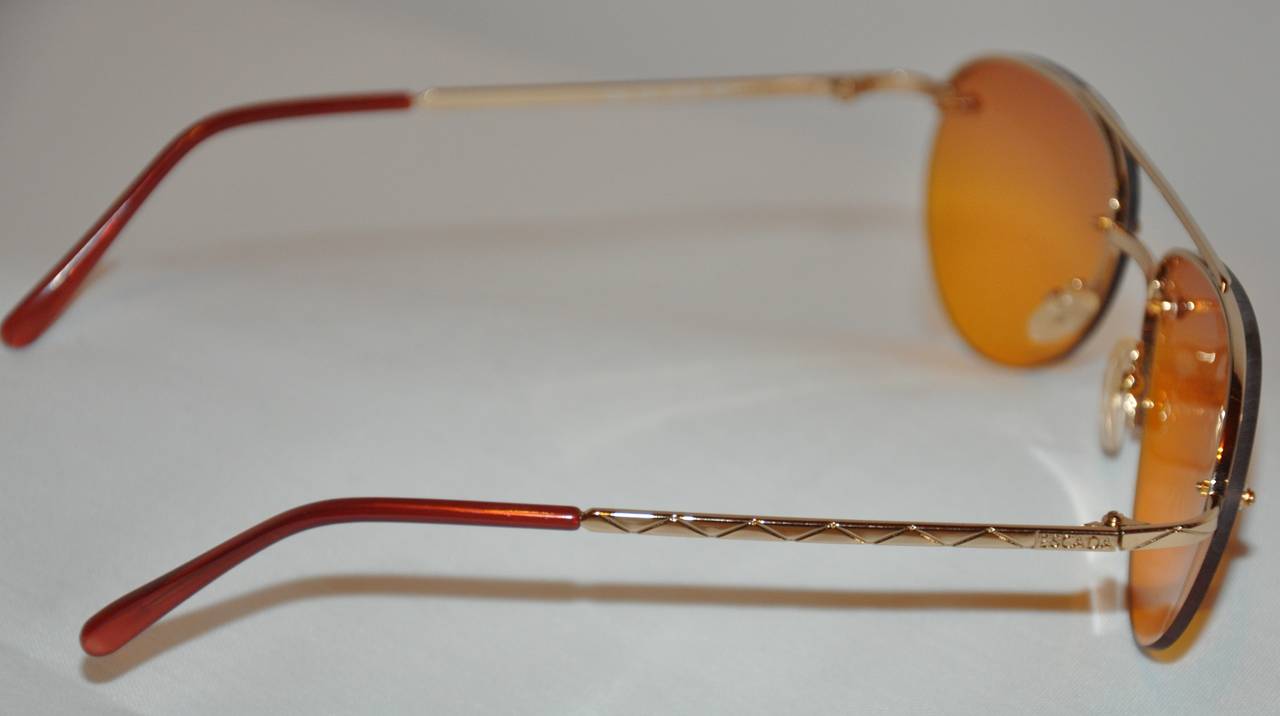 Escada Goldbeschläge mit goldenen Lens-Sonnenbrille