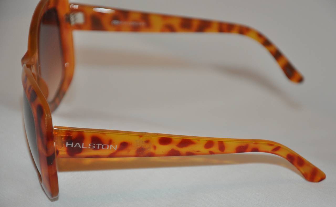 Halston large tortoise print lucite sunglasses measures 5 6/8
