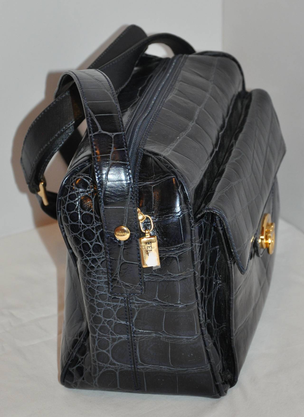 Gianfranco Ferre black croc-embossed calfskin leather zippered top shoulder bag has adjustable straps measuring 1