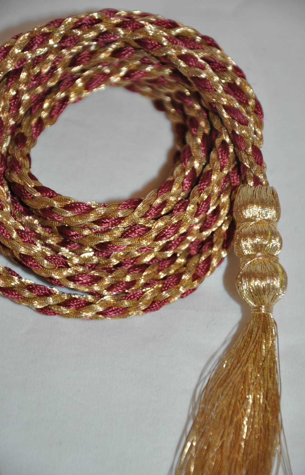 Yves Saint Laurent iconic Russian Collection coco-brown silk cord woven with metallic gold lame is accented with 3