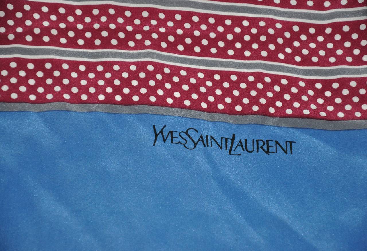 Yves Saint Laurent signature multi-colors of grape, gray, white and blue polka dot silk scarf measures 15