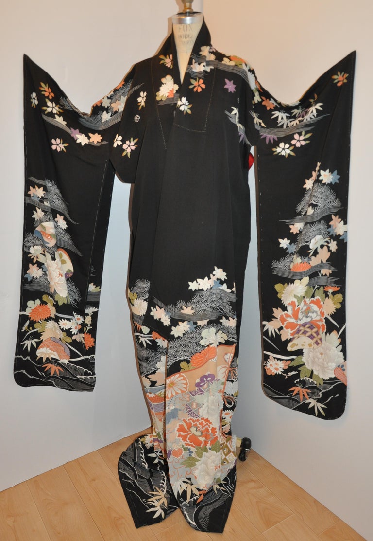        This wonderful black silk kimono with multi-color 