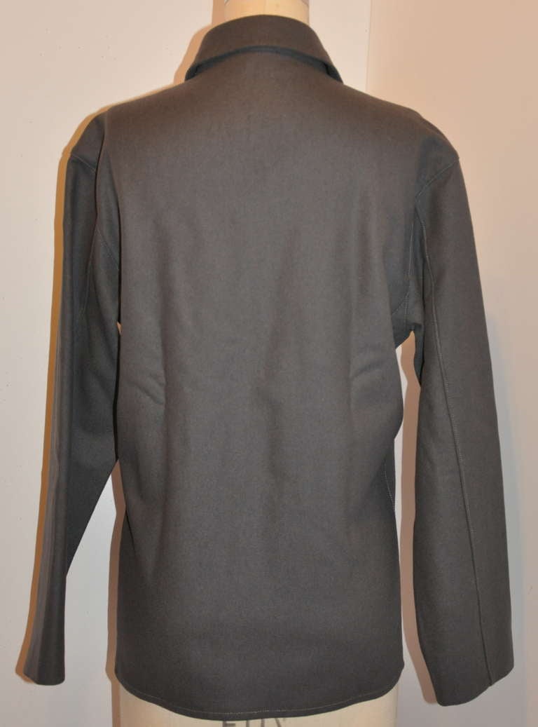 Calvin Klein's 'Collection' olive-khaki shade top has a micro-hardware zipper front measuring 24