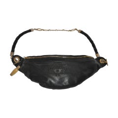 Bottega Veneta - Pochette en cuir d'agneau noir ornée du logo de la marque