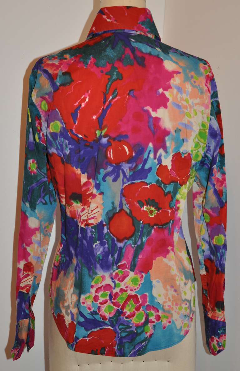 Etro multi-color floral print blouse has a total of eight(8) buttons on front with two micro ones on the front collar.
   The front measures 23