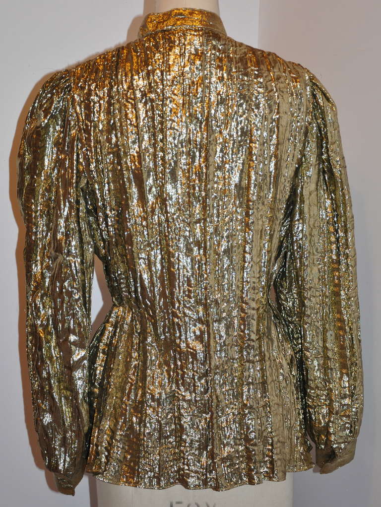 ADRI gold lame with manderin collar blouse measures 24 1/2