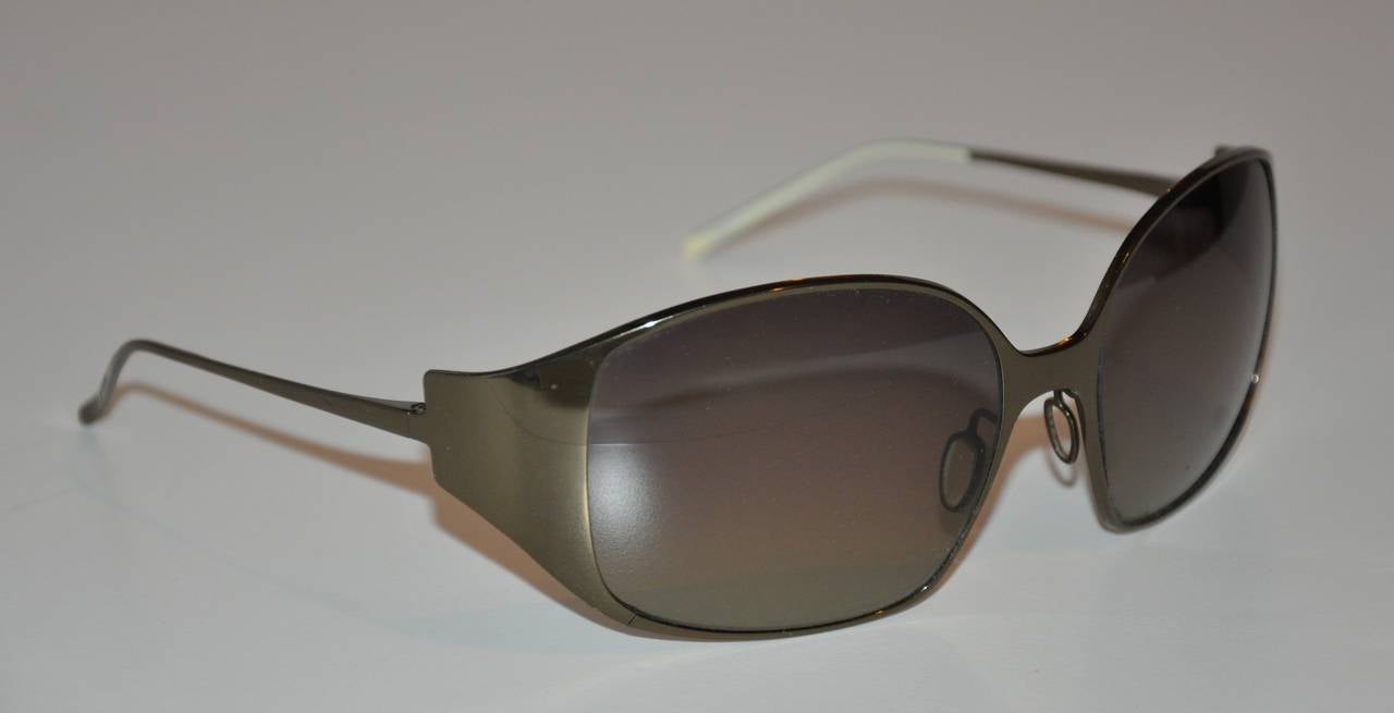 Christian Roth steel-gray semi-wrap titanium frame sunglasses measures 5 3/4