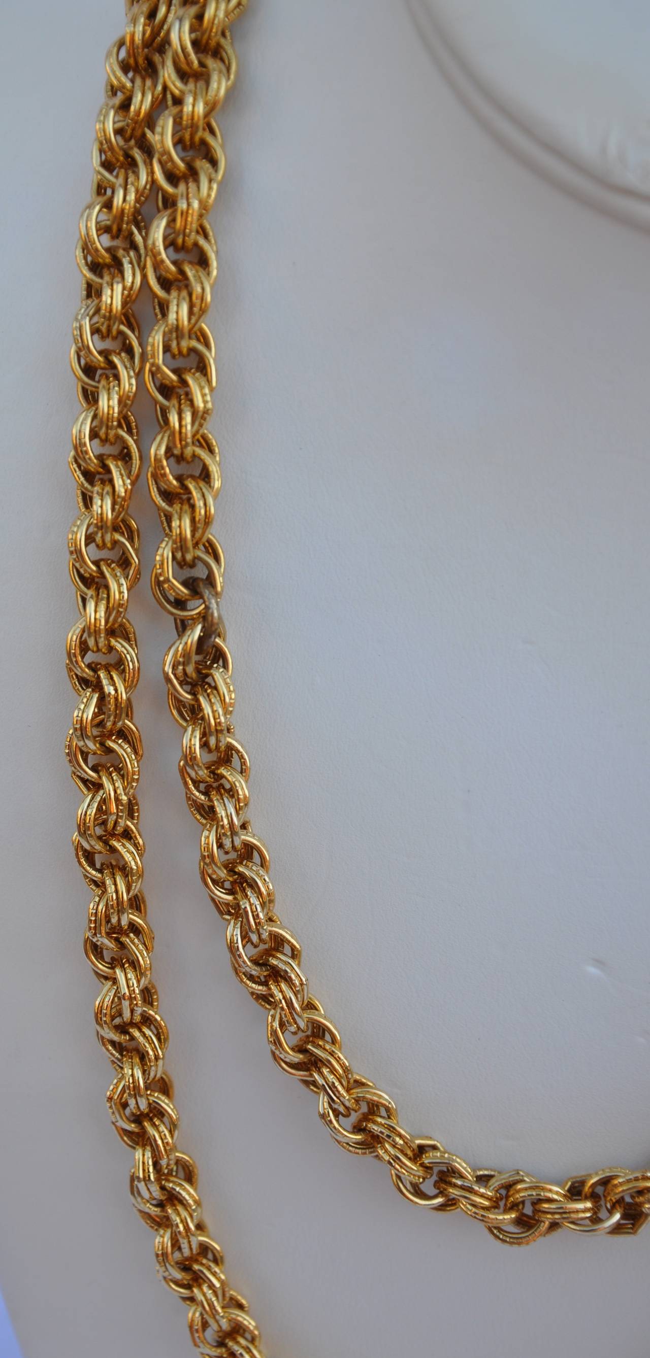 This wonderfully detailed multi-link gilded gold with vermeil finish gold necklace measures 45" in total length which can be worn as a single strand or as a double strand necklace. The width measures 3/8" in circumference.