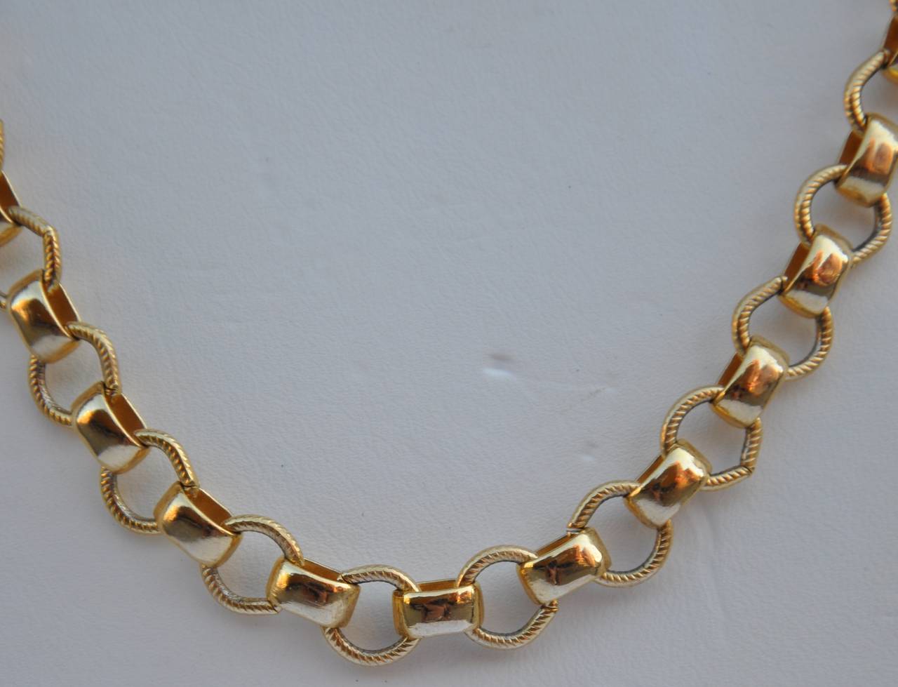 Gilded gold vermeil finish European-style chain-link necklace measures 18" in length, 5/16" in width, and 2/8" in depth.