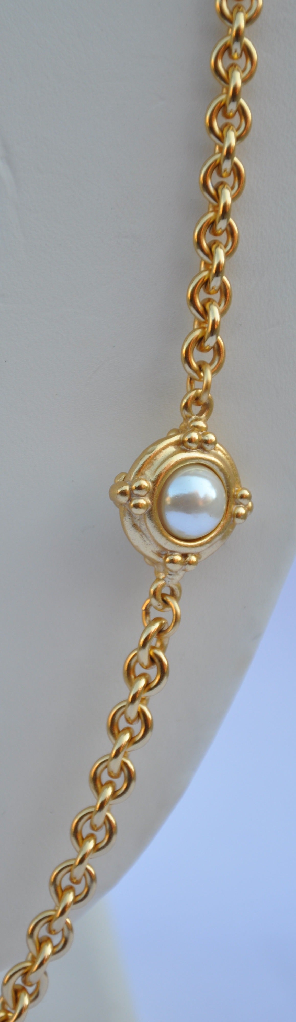 Carolee's wonderful thick vermeil finished gilded gold hardware necklace is accented is thick pearls, eight in all. The total length measures 49", width is 7/8", depth is 1/2".