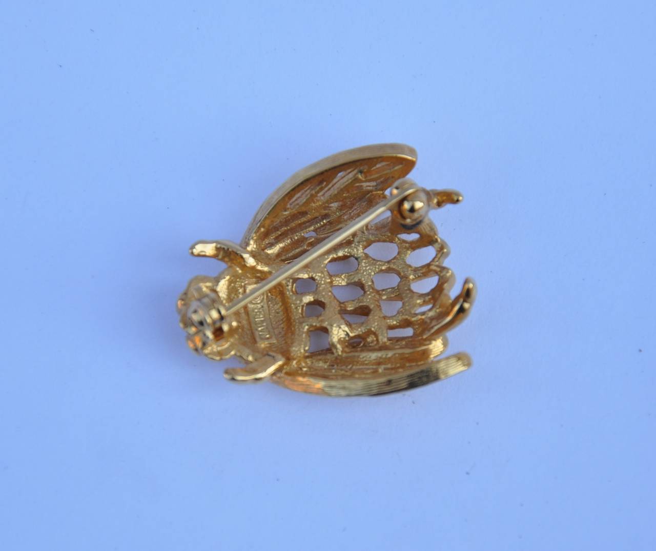 Napier gold tone Bumble Bee brooch measures 1 1/8" in length, 1" in width and 3/8" in depth.