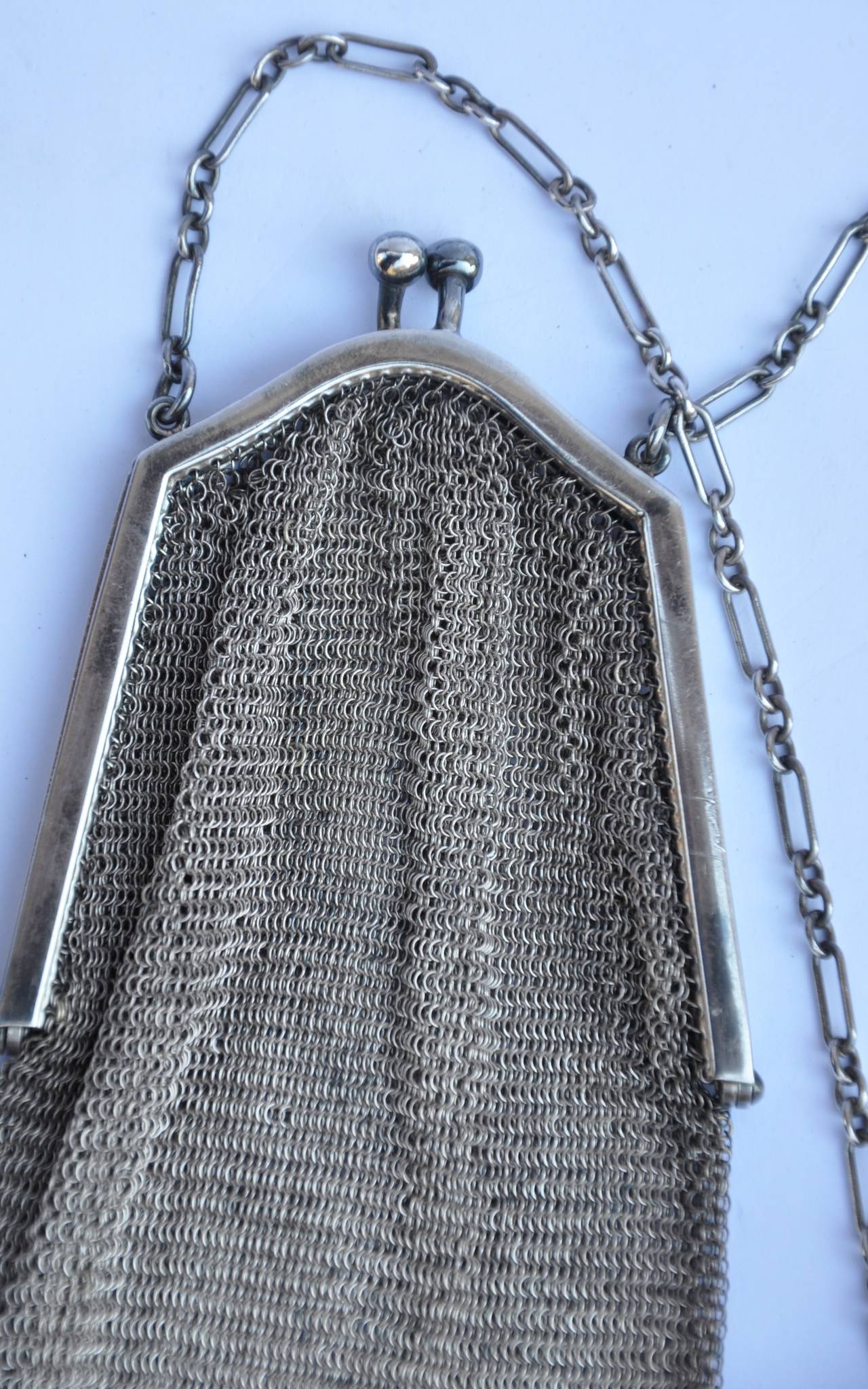 Wonderfully detailed, this sterling silver mesh weave evening handbag is accented with a sterling silver fringe. The fringe measures from 1