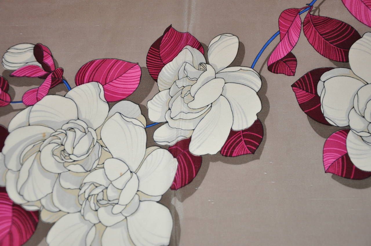 Gucci multi-color floral print silk scarf measures 33' x 32
