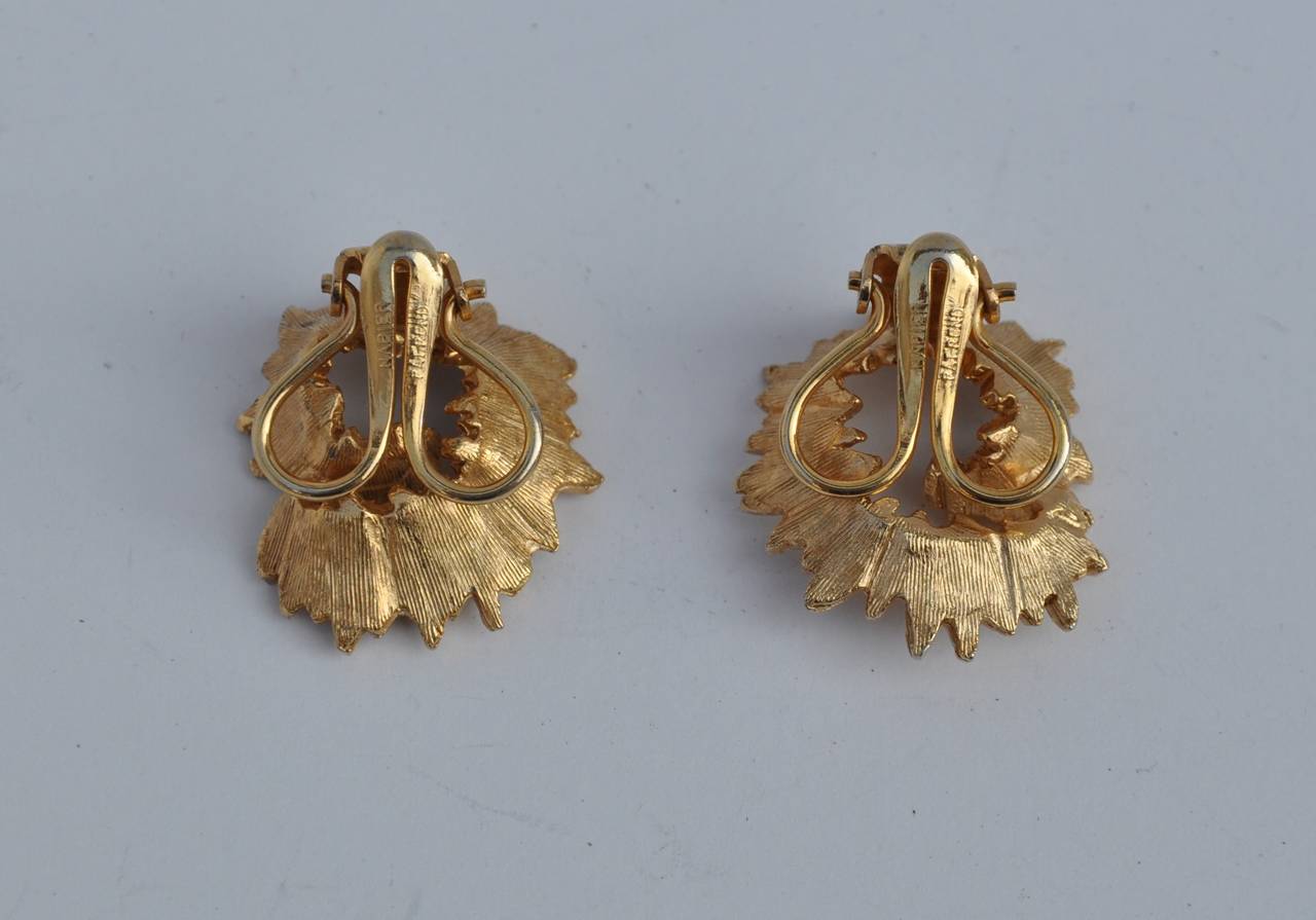 Napier's wonderful gilded gold vermeil "Swirl" ear clips measures 1" in height, width is 3/4", depth is 1/2".