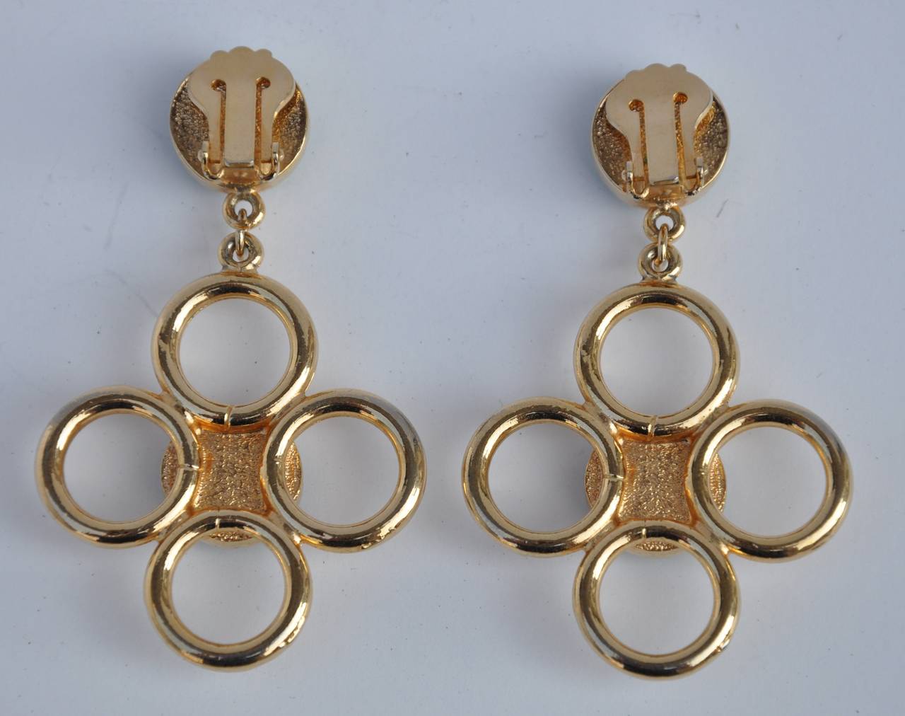 These gilded gold vermeil finish with turquoise-like earrings measures 2 5/8