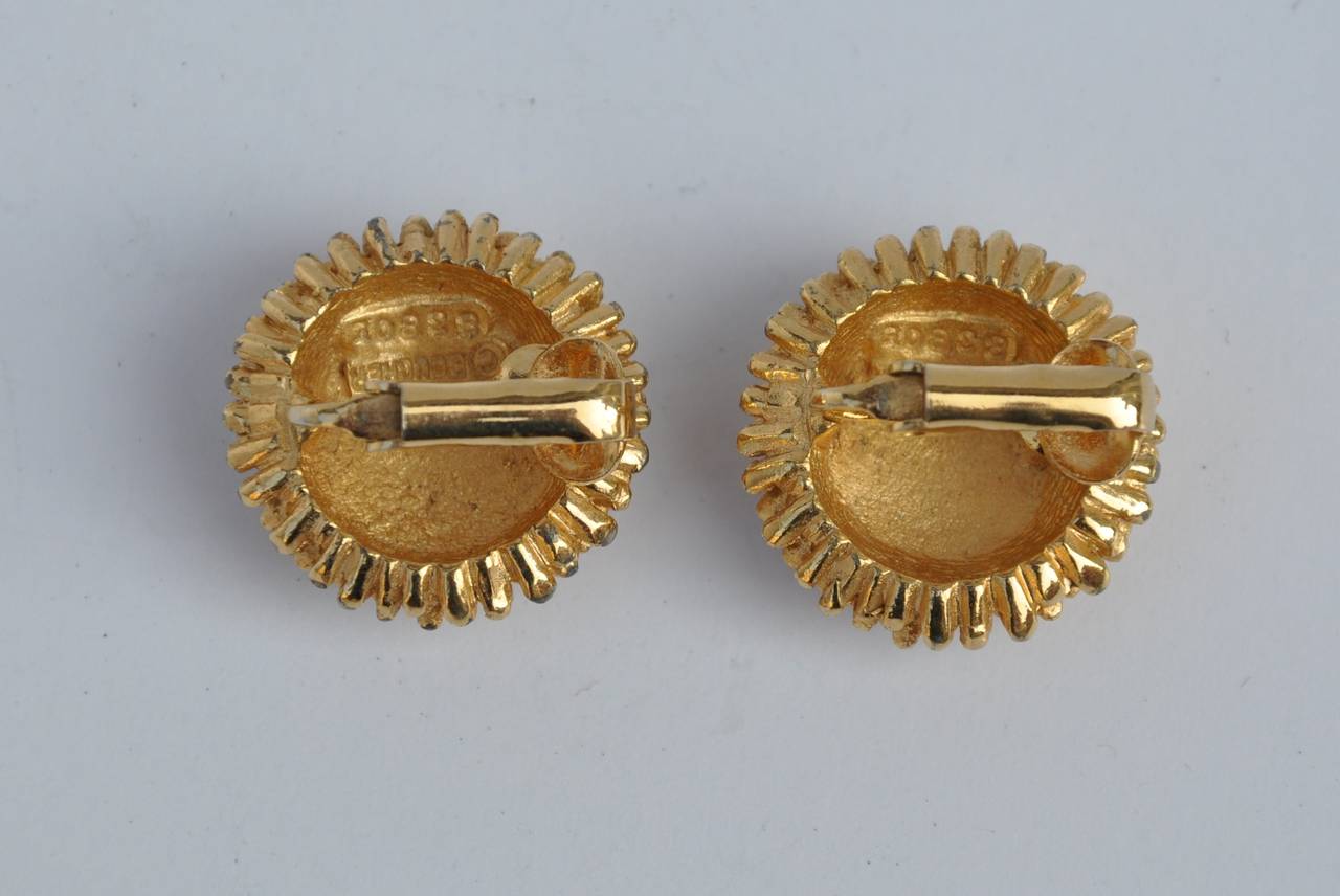 Boucher gilded gold vermeil elegant ear clips measures 7/8" in circumference and 1/2" in depth.