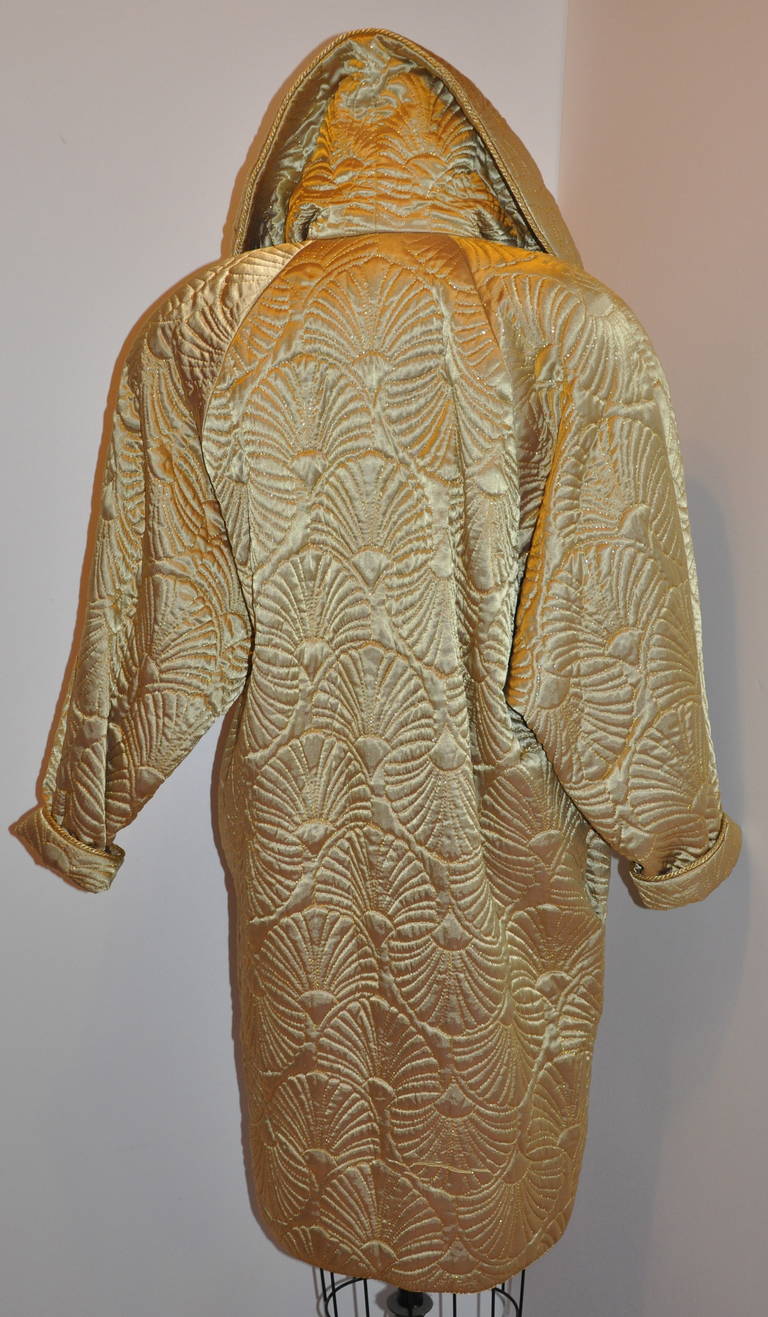 This wonderful Joan Raines for Bergdorf Goodman cocoon jacket is definately a entrance maker for those special evening occasions.
    Cocoon jacket is fully lined with silk. The exterior gold silk is detailed with metallic gold thread stitching and