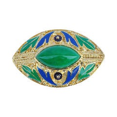 Brosche aus Gold mit blauer und grüner Emaille, akzentuiert mit großen Jadeitsteinen