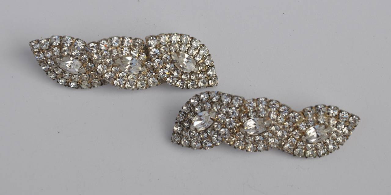 These elegant multi-rhinestones evening ear clips measures 2 1/4" in length, width is 5/8" and a depth of 2/8".