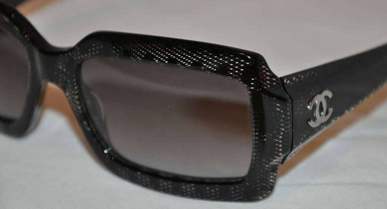 These wonderful Chanel black with clear lucite sunglasses has a 