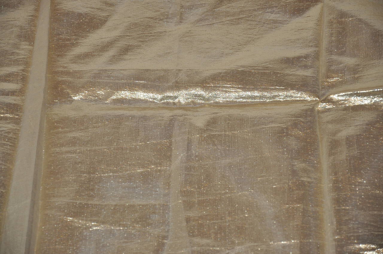 Large metallic gold lame scarf measures 44