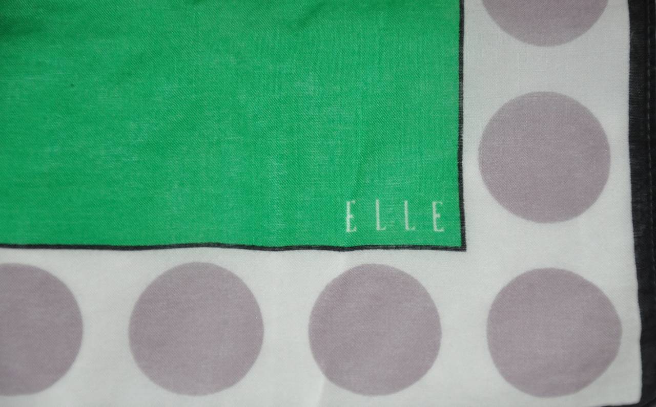 Elle 100% Switerland cotton handkerchief of colors of green, navy, white, taupe and navy borders measures 16