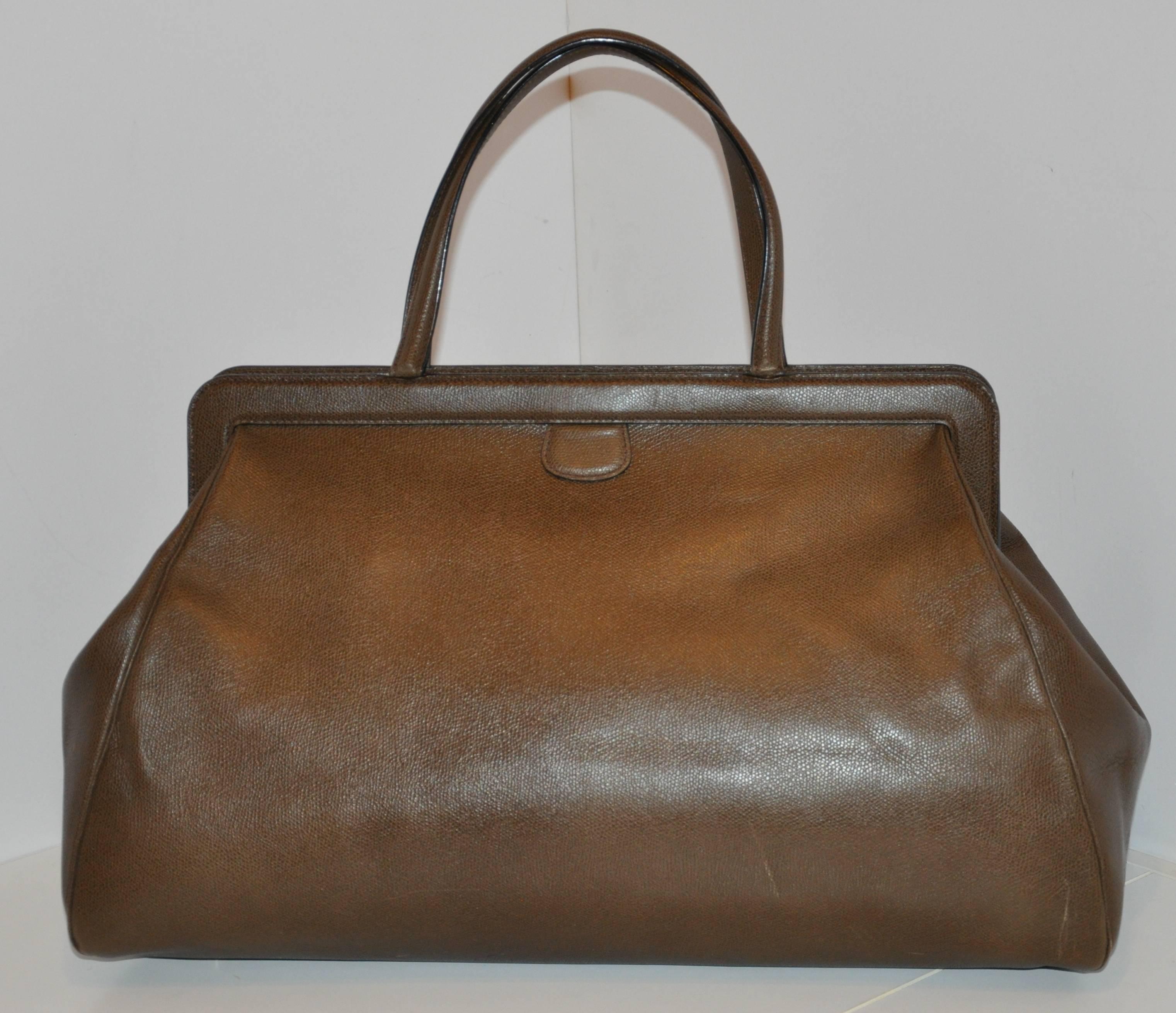         Valextra wonderful large textured brown calfskin zippered top handbag has an optional adjustable shoulder strap if needed. This large handbag is fully lined with tan leather as well as a interior large zippered compartment within. The