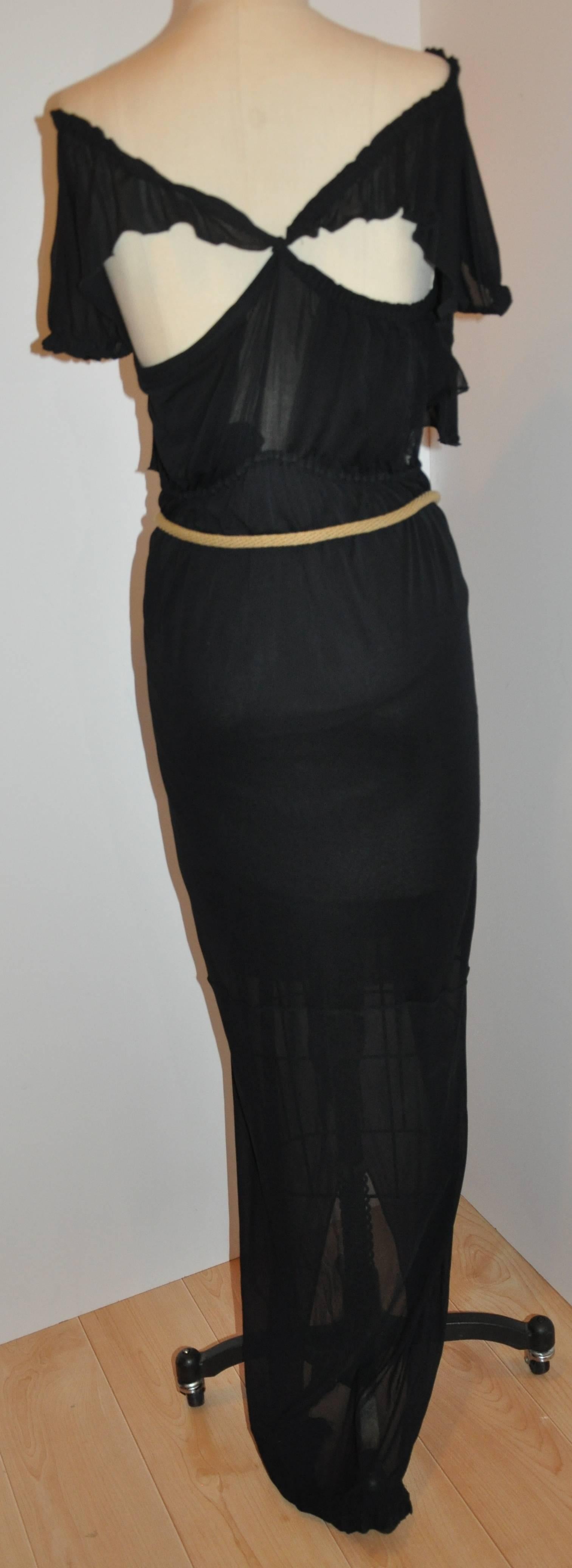         Yves Saint Laurent wonderfully wicked and sexy black asymmetrical draped maxi dress of silk jersey measures 59" in length in front, back is 42". The elastic draped neckline measures 32". Waist is 32", hips are 35".