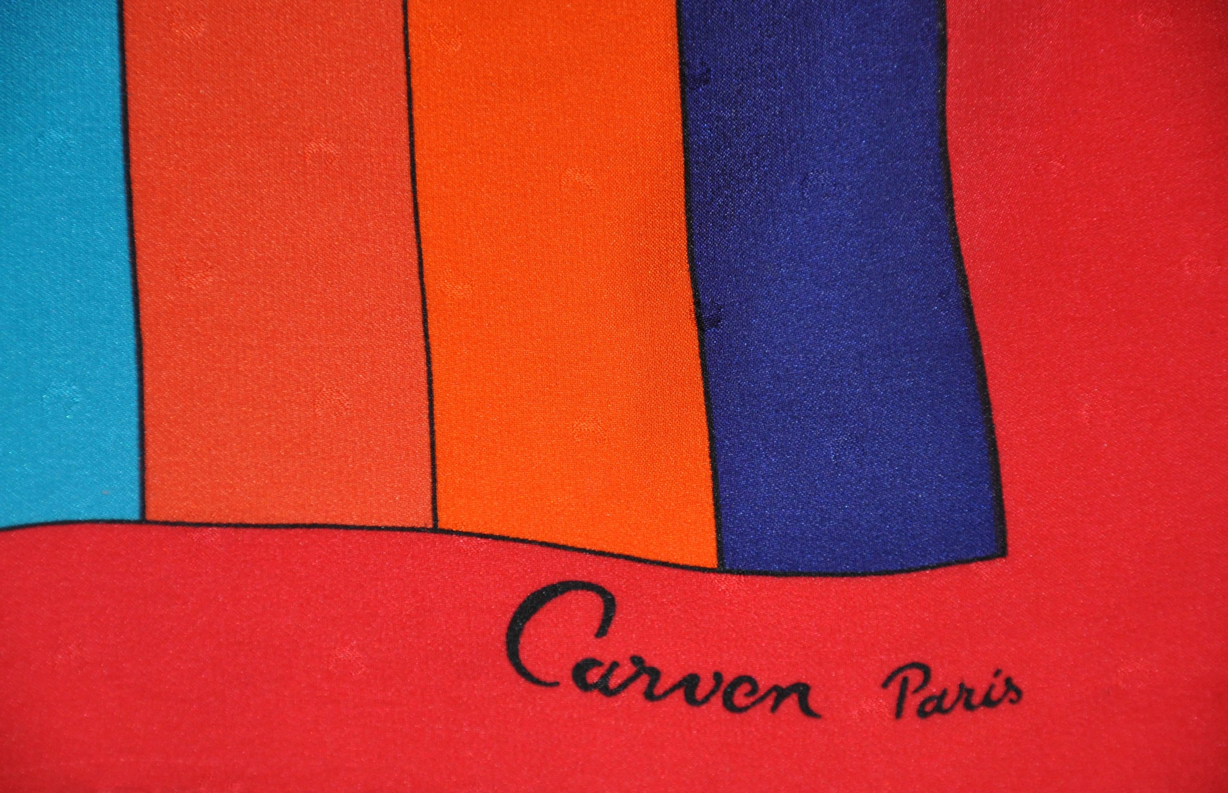       Carven bold multi-colors in silk crepe de chine shows in this wonderful color-clock print. The scarf measures 34
