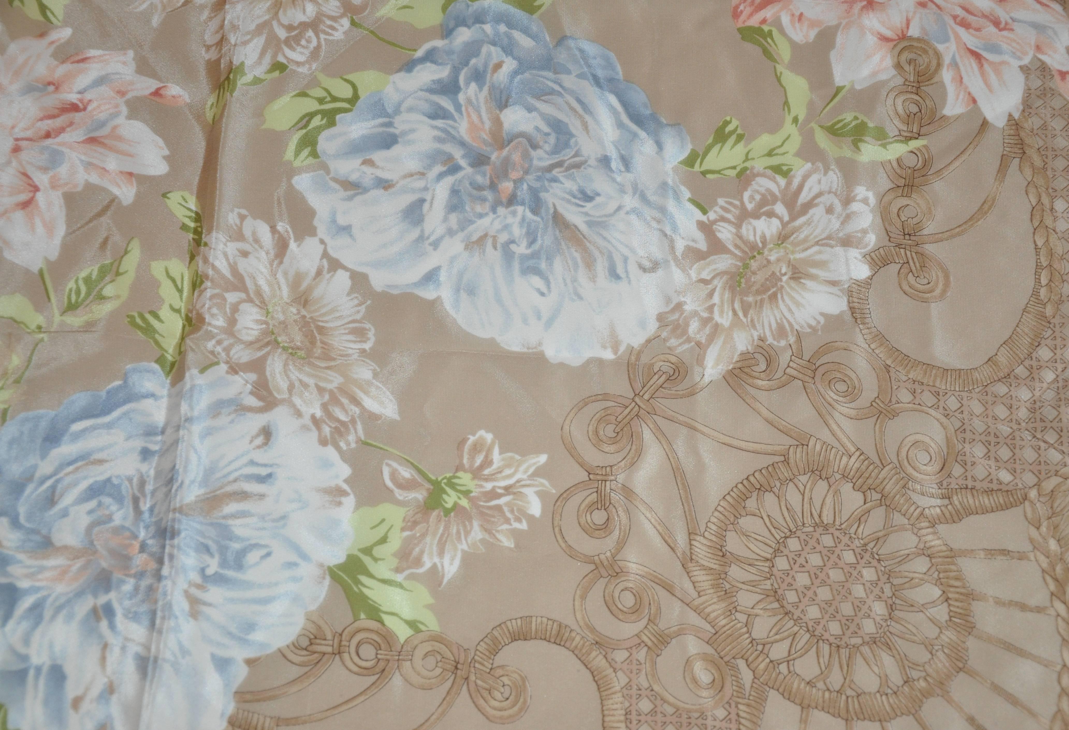         Liz Claiborne taupe multi-floral print silk scarf is finished with hand-rolled edges and measures 30