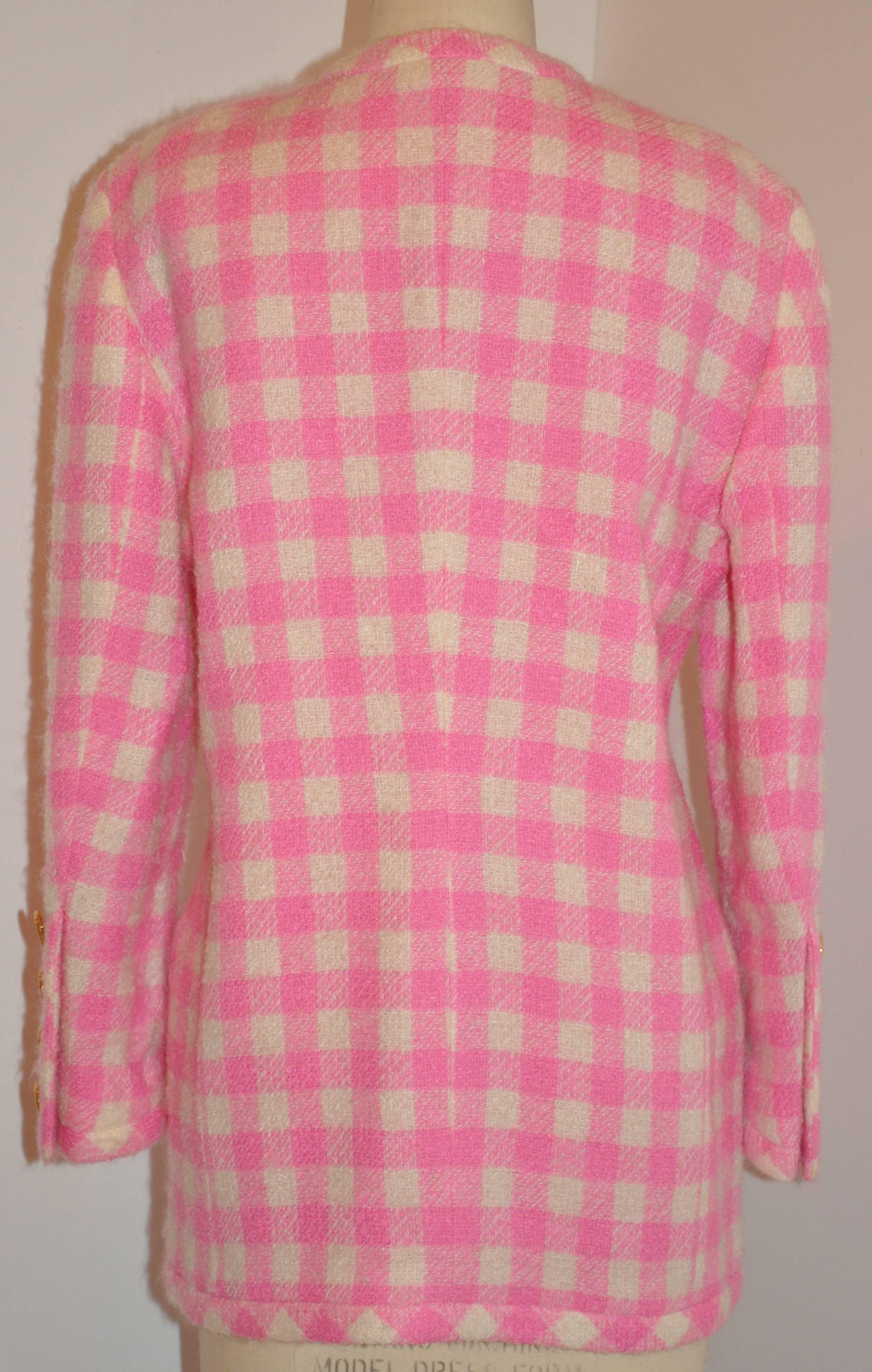         Escada by Margaretha Ley wonderfully elegant fully lined bold pink & cream checkered jacket is detailed with five matching pink with gold-tone buttons in front as well as four patch pockets finished with matching buttons. The sleeve's cuff