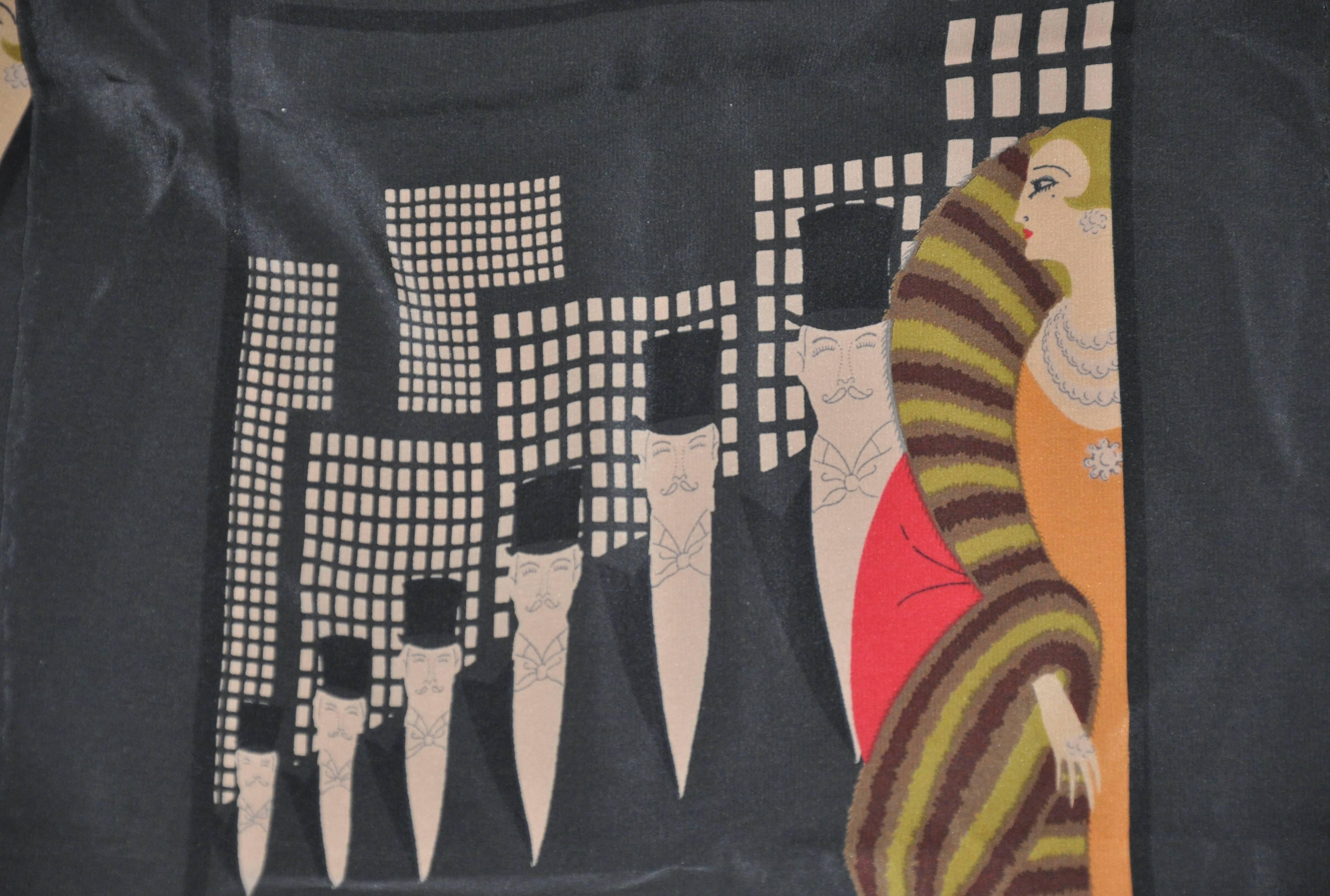       Erte wonderfully detailed black silk scarf is detailed with 