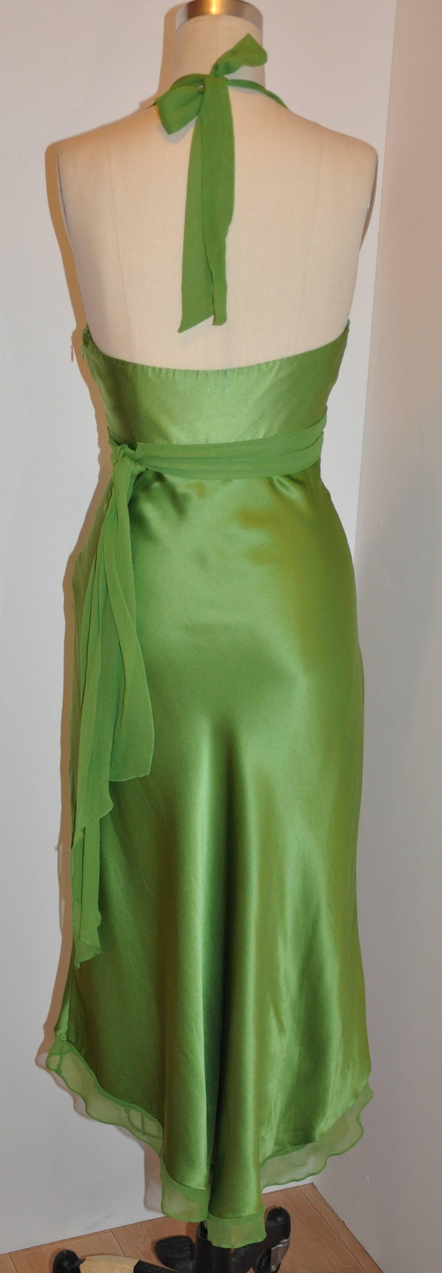        This wonderful elegant Irish-green silk crepe di chine optional halter tie strapless cocktail evening dress is accented with silk chiffon. Cut on the bias, this lovely dress body hugs where needed and yet elegant in movement. There is an